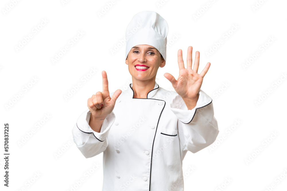 Middle-aged chef woman over isolated background counting seven with fingers Middle-aged chef woman over isolated background counting seven with fingers