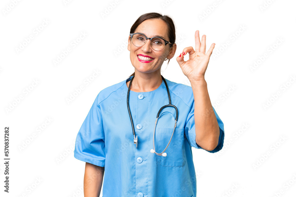 Middle-aged nurse woman over isolated background showing ok sign with fingers Middle-aged nurse woman over isolated background showing ok sign with fingers