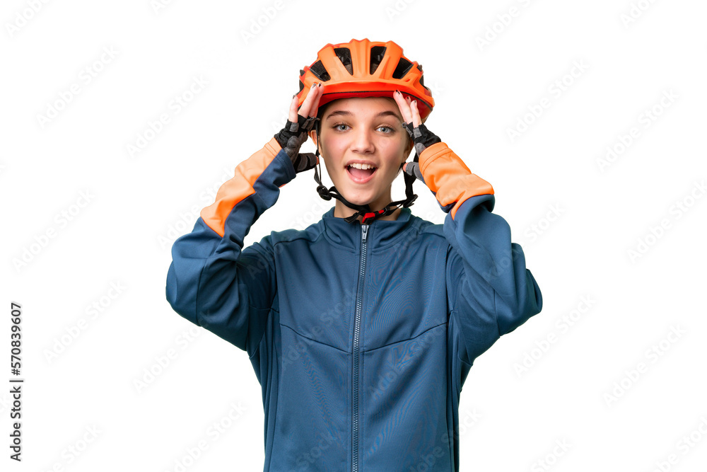 Teenager cyclist girl over isolated chroma key background with surprise expression Teenager cyclist girl over isolated chroma key background with surprise expression