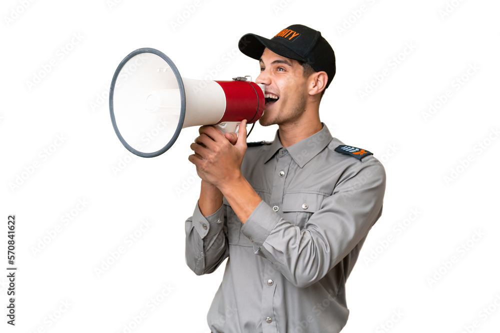 Young security man over isolated background shouting through a megaphone Young security man over isolated background shouting through a megaphone