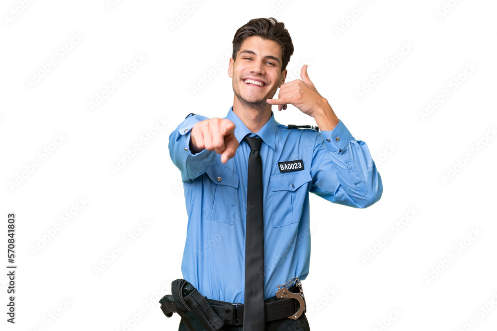 Young police man over isolated background making phone gesture and pointing front Young police man over isolated background making phone gesture and pointing front