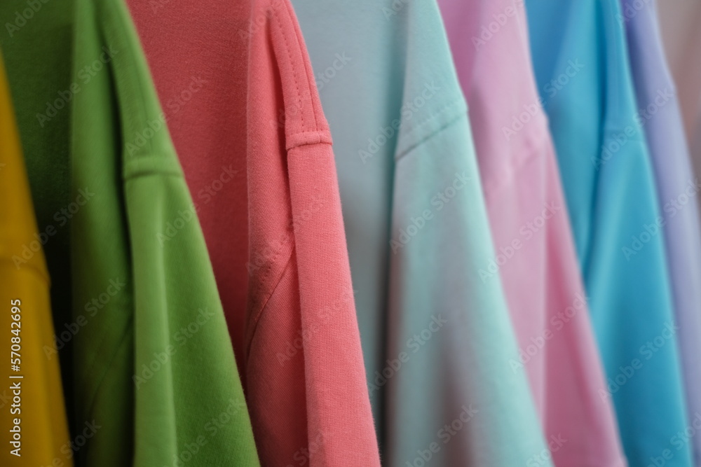 colorful shirts on hangers