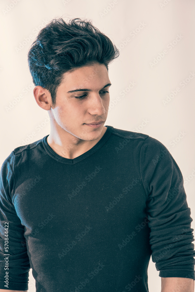 Handsome and fit young man standing on white background Handsome and fit young man standing on white background