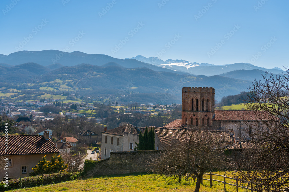 Cathedral of Saint Lizier and panorama of the Pyrenees, in Saint Lizier, in Ariège, in Occitanie, France Cathedral of Saint Lizier and panorama of the Pyrenees, in Saint Lizier, in Ariège, in Occitanie, France