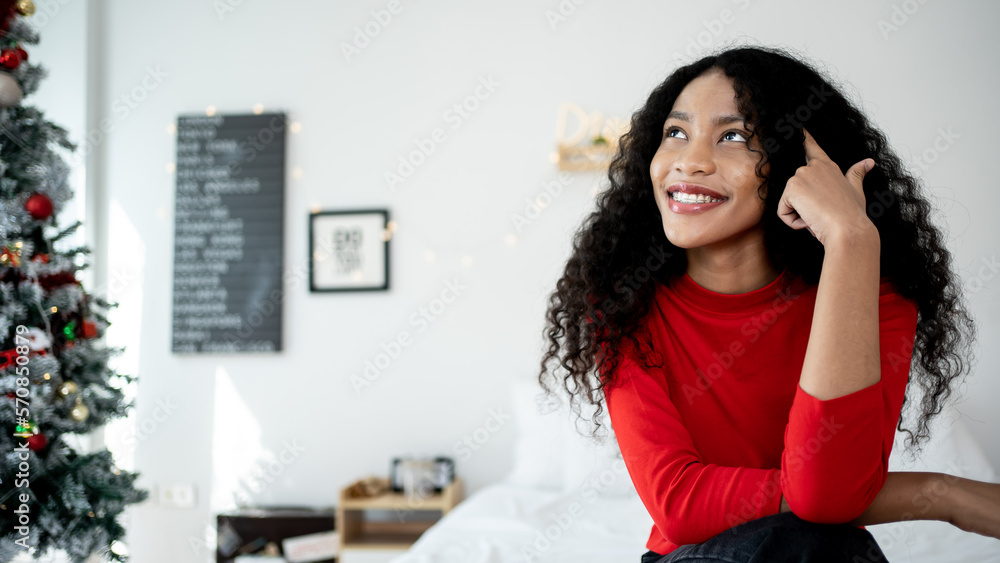 Portrait of a beautiful young african woman smiling and thinking positive toothily smile. Portrait of a beautiful young african woman smiling and thinking positive toothily smile.