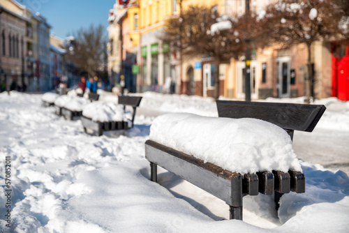 Wallpaper Mural Benches in the town covered with snow in winter. Winter weather in the city Torontodigital.ca