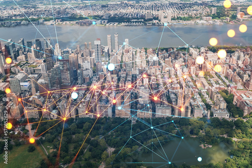 Aerial panoramic helicopter city view of Upper West Side Manhattan neighborhoods and Central Park, New York, USA. Social media hologram. Concept of networking and establishing new people connections