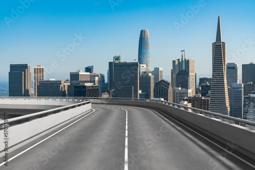 Empty urban asphalt road exterior with city buildings background. New modern highway concrete construction. Concept way to success. Transportation logistic industry fast delivery. San Francisco. USA. © VideoFlow