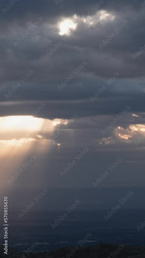 Vertical Video Sweeping Sun Rays Break Through Storm in Arizona Vertical Video Sweeping Sun Rays Break Through Storm in Arizona