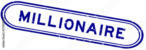 Grunge blue millionaire word rubber seal stamp on white background