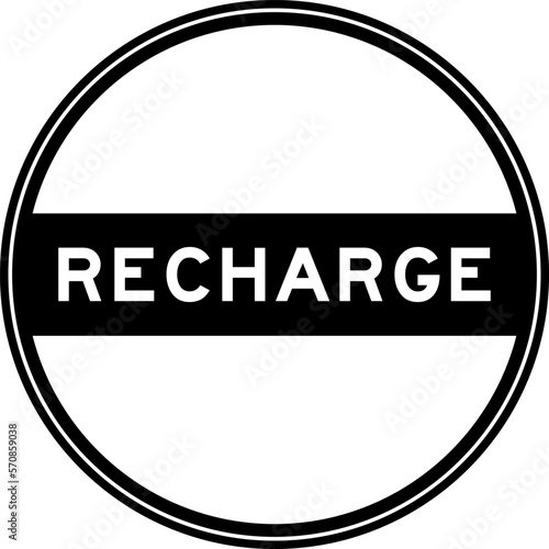Black color round seal sticker in word recharge on white background
