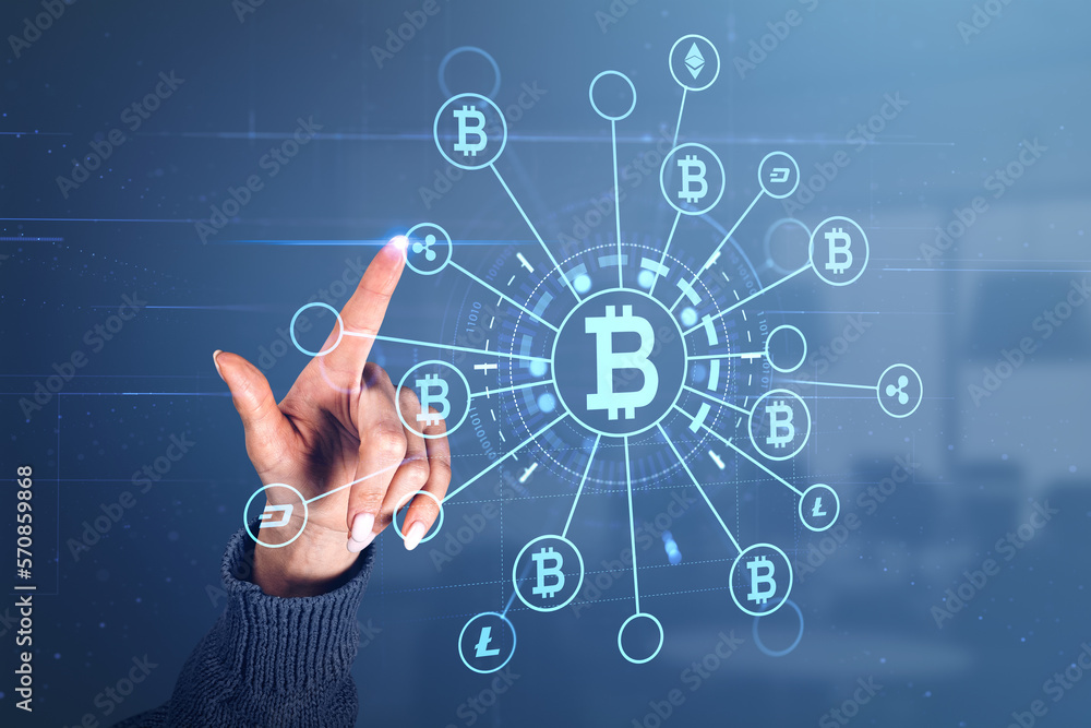Woman finger touch cryptocurrency hologram icons and blockchain Woman finger touch cryptocurrency hologram icons and blockchain