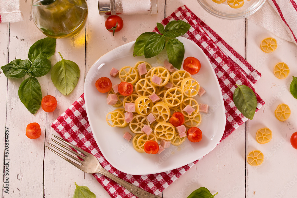 Ruote pasta with tomato and ham. Ruote pasta with tomato and ham.