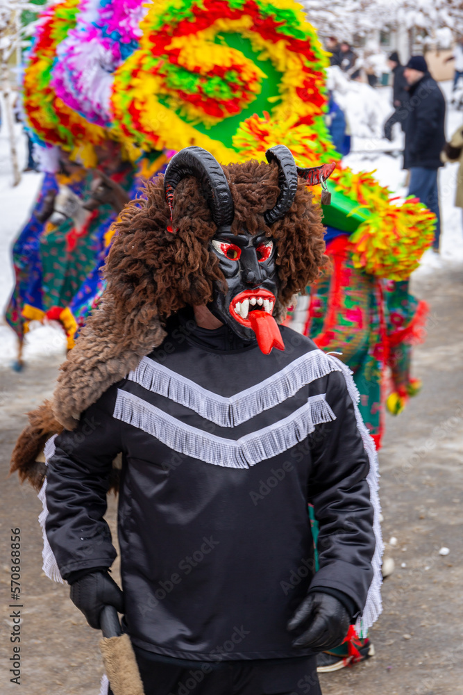 Gody Zywieckie - traditional winter parade of 'Dziady', 'Jukace', folk custom in Zywiec region, man dressed in traditional costume of devil, Milowka, Poland