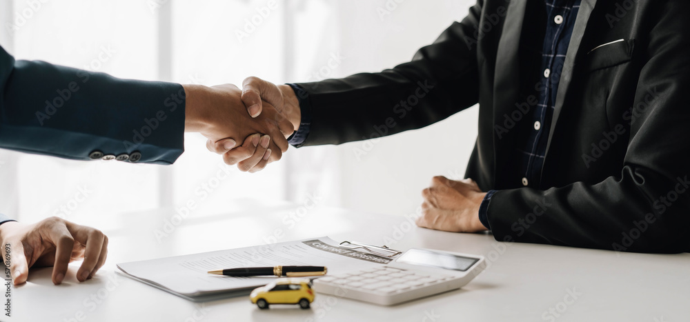 Handshake of cooperation customer and salesman after agreement, successful car loan contract buying or selling new vehicle - obrazy, fototapety, plakaty 