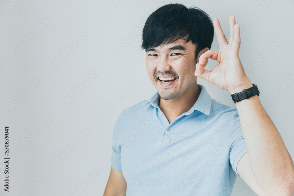 adult asian man.young male person .posing smiling laughing look excited surprised thinking positive happy people.empty space for text advertising.white background.attractive fashion adult asian man.young male person .posing smiling laughing look excited surprised thinking positive happy people.empty space for text advertising.white background.attractive fashion