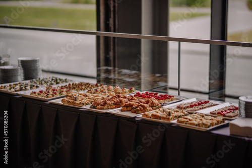 various snacks laid out on a buffet table