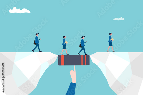 businessman hand holding a book bridging the gap in education for a group of people walking on. concept of success, education level and skill development