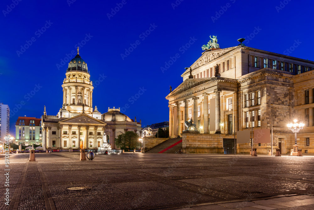 Concert Hall (Konzerthaus) and New Church (Deutscher Dom or Neue Kirche) on Gendarmenmarkt square at night in Berlin, Germany Concert Hall (Konzerthaus) and New Church (Deutscher Dom or Neue Kirche) on Gendarmenmarkt square at night in Berlin, Germany