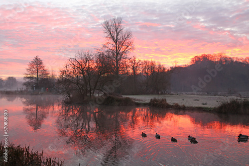 Winter sunrise along the River Wey, Godalming, Surrey, UK. photo