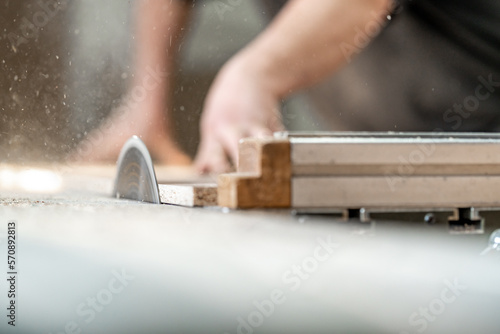 cutting laminate for the production of furniture on a circular saw