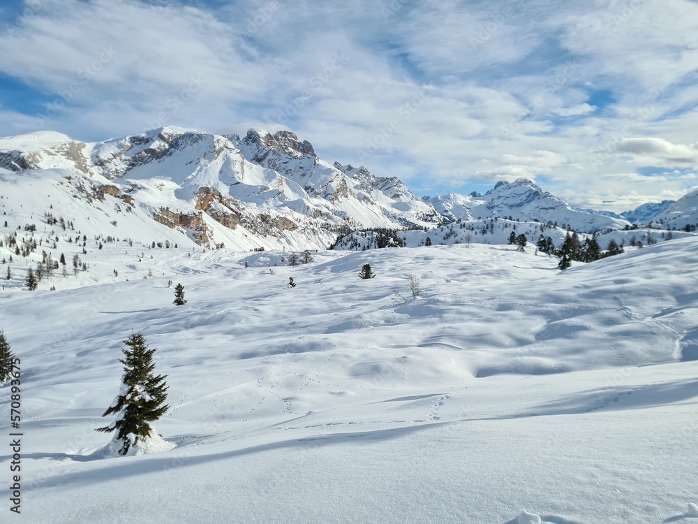 Beautiful winter wonderland mountain scenery with traditional mountain huts in the Alps , Alta Badia, Dolomites, South Tyrol, Italy