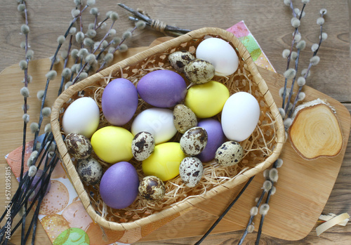 colorful eggs in a basket for easter
