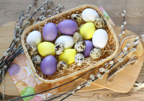 colorful eggs in a basket for easter