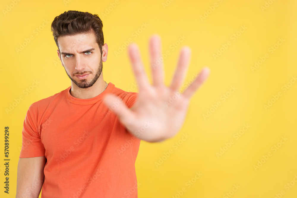 Fototapeta premium Caucasian man gesturing prohibition with hand