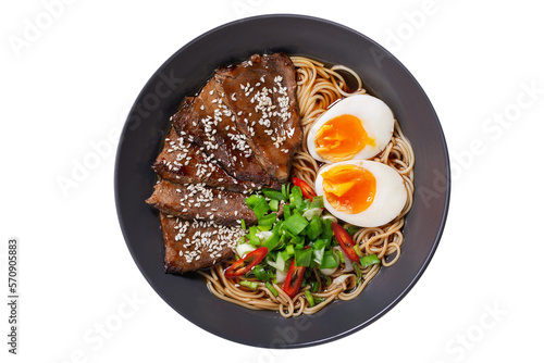 Ramen soup with beef, egg, chives isolated on transparent background, top view