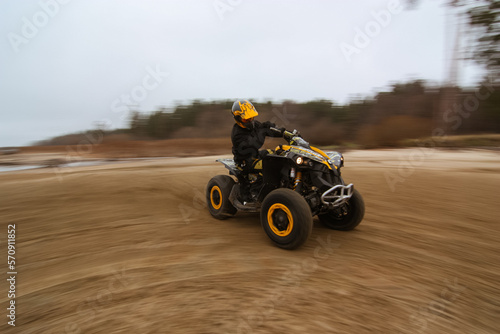 athlete drifting on a quad bike