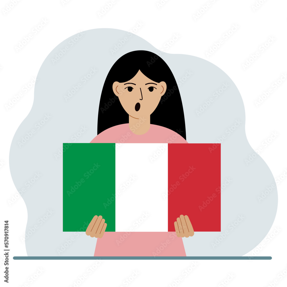 A woman holds an Italian flag in his hands. The concept of demonstration, national holiday or patriotism. A woman holds an Italian flag in his hands. The concept of demonstration, national holiday or patriotism.