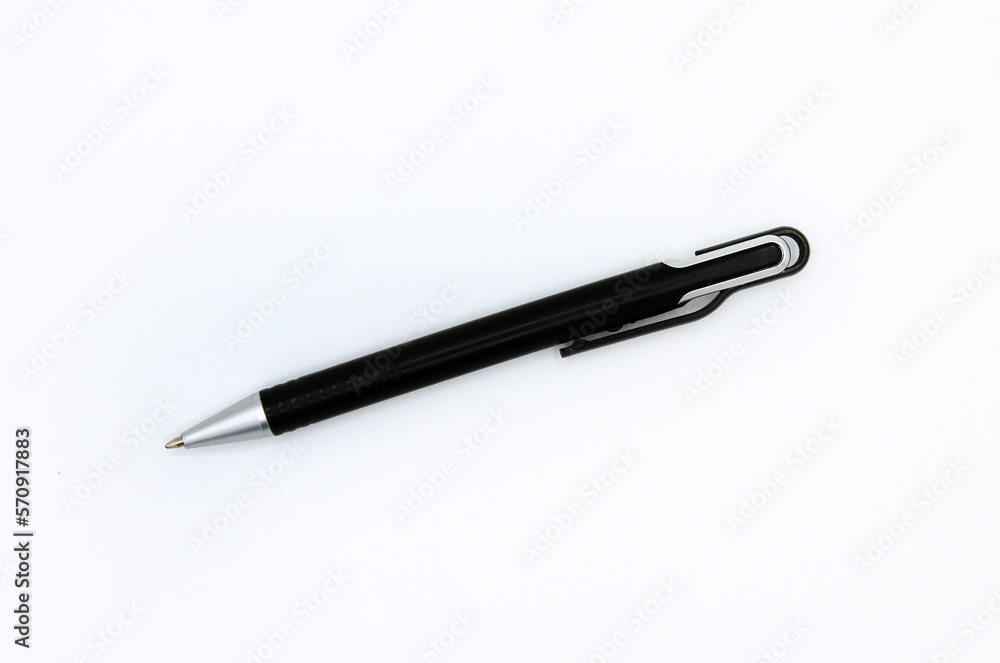 Flat lay of black modern pen or mechanical pencil isolated on white background. Top view of object for writing Flat lay of black modern pen or mechanical pencil isolated on white background. Top view of object for writing