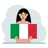 A woman holds an Italian flag in his hands. The concept of demonstration, national holiday or patriotism.