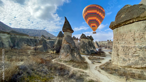 Rock formations and colorful baloon panorama landscape at pasabagları valley in Cappadocia, Nevsehir, Turkey
