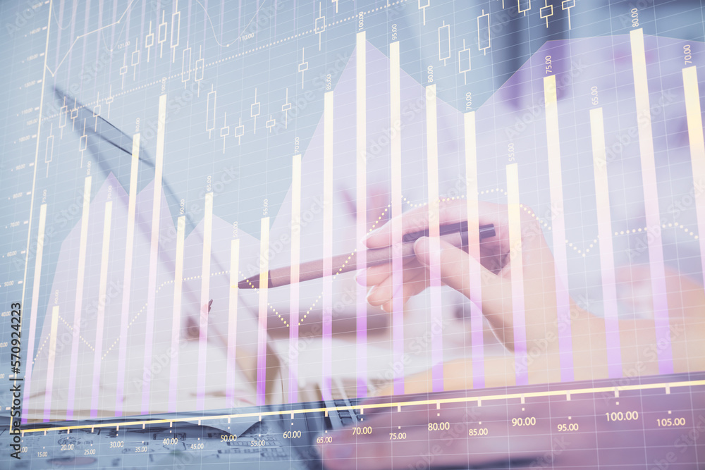 Multi exposure of woman hands typing on computer and financial graph hologram drawing. Stock market analysis concept. Multi exposure of woman hands typing on computer and financial graph hologram drawing. Stock market analysis concept.