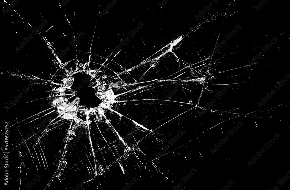Pieces of destructed Shattered glass. Royalty high-quality free stock photo  image of broken glass with sharp pieces. Break glass white and black  overlay grunge texture abstract on black background Stock Photo