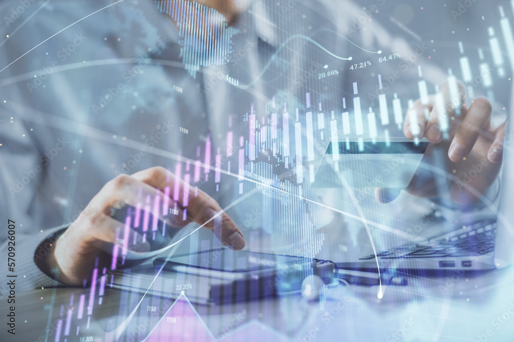 Double exposure of man hands holding a credit card and Forex graph drawing. Stock trading and digital fintech in Internet E-commerce concept. Double exposure of man hands holding a credit card and Forex graph drawing. Stock trading and digital fintech in Internet E-commerce concept.