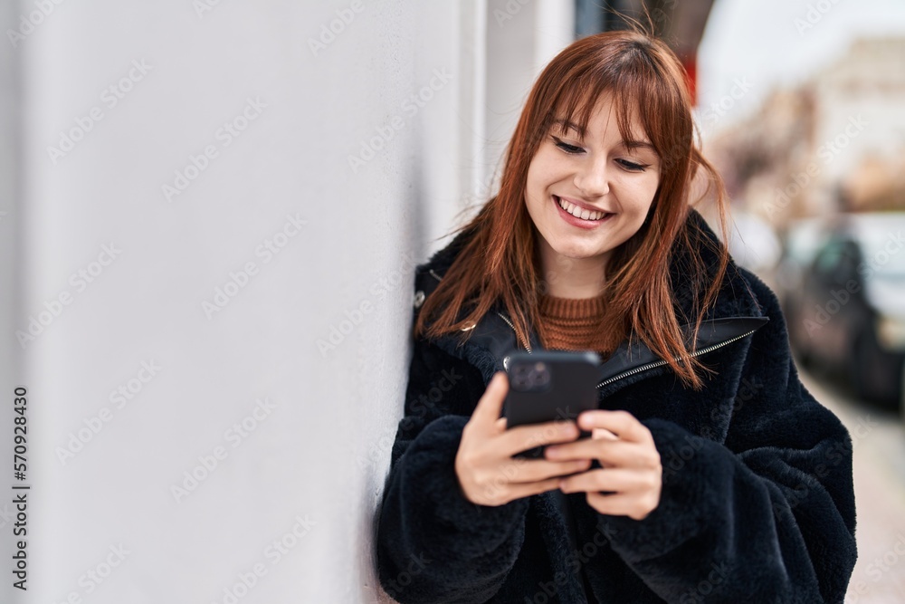 Young woman smiling confident using smartphone at street Young woman smiling confident using smartphone at street