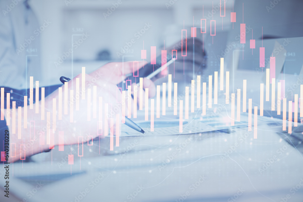 Double exposure of man's hands holding and using a phone and financial chart drawing. Market analysis concept. Double exposure of man's hands holding and using a phone and financial chart drawing. Market analysis concept.