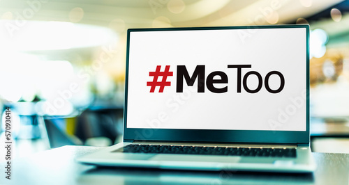 Laptop computer displaying the sign of MeToo movement photo