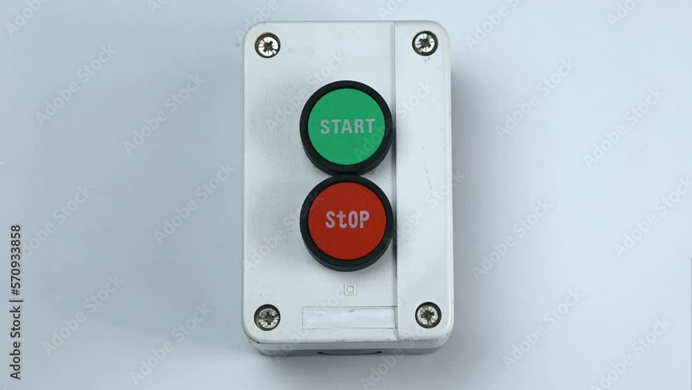 The finger presses the stop button. Two buttons in the case, green - start switch, red - stop switch The finger presses the stop button. Two buttons in the case, green - start switch, red - stop switch