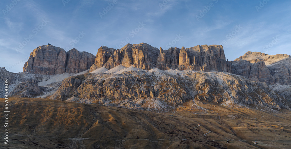 Panoramic view of rocky mountains against sky, Dolomites, Pordoi Pass, Italy