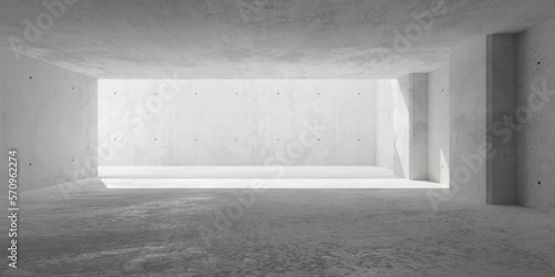 Abstract large, empty, modern concrete room, sunlight from outside, wall pillars and rough floor - industrial interior background template