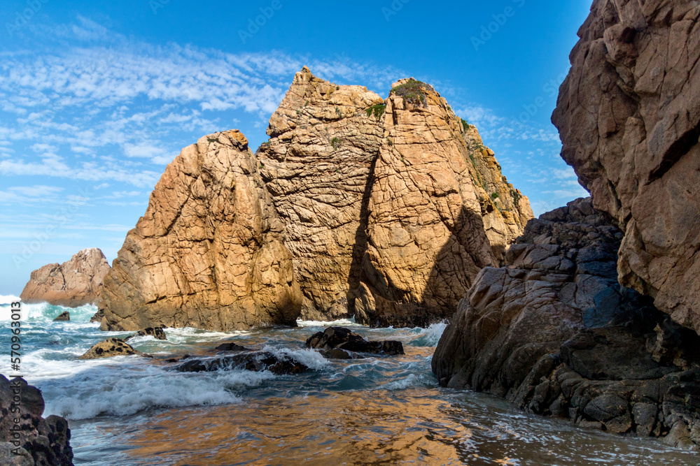 Rock cliffs from Praia da Ursa beach on coast of Portugal