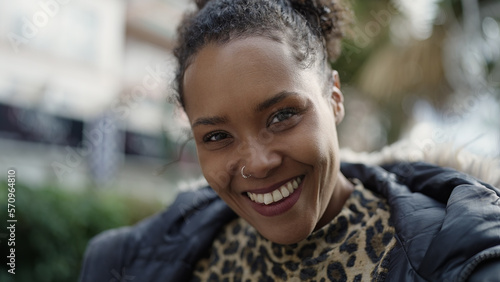 African american woman smiling confident standing at street