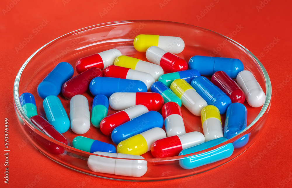 Medical pills . On red background. Top view . Medicine concept Medical pills . On red background. Top view . Medicine concept