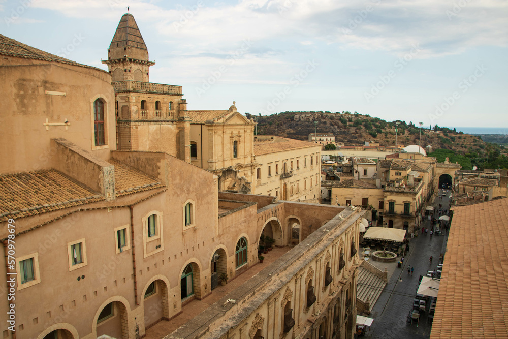view from the terrace of Santa Chiara church and convent on the cathedral dome and Corso Vittorio Emanuele, Noto, Sicily, Italy