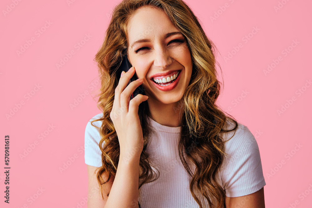 cheerful blonde woman talking on phone cheerful blonde woman talking on phone