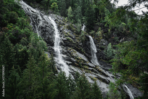 The Nardis Waterfall in Trentino Alto Adige during a foggy and rainy day in autumn, Northern Italy